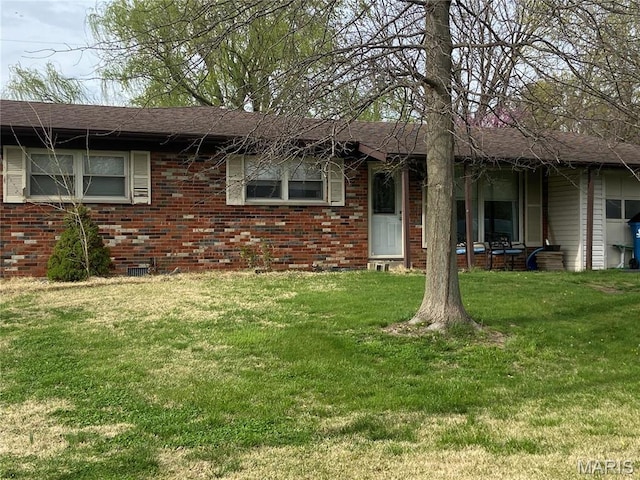 41 Mars Dr, Belleville, IL 62226 - ranch-style home with a front lawn, brick siding, and a shingled roof