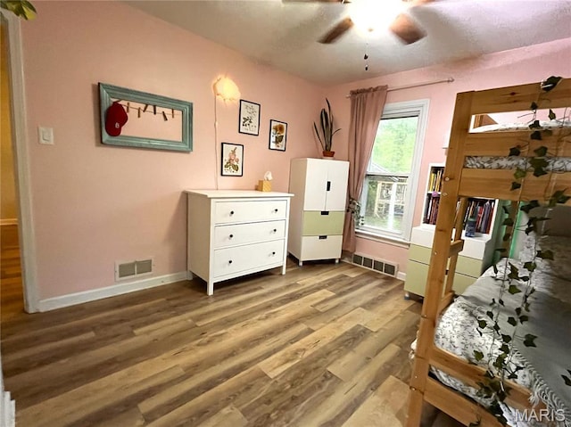 1531 Prather Ave, Saint Louis, MO 63139 - bedroom with baseboards, wood finished floors, and ceiling fan