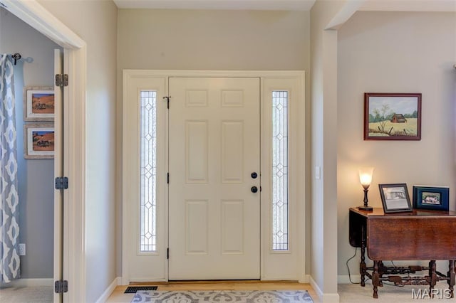 1024 Brook Mont Dr, Ofallon, MO 63366 - foyer entrance featuring baseboards and light wood-style floors