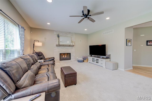 1024 Brook Mont Dr, Ofallon, MO 63366 - carpeted living room featuring recessed lighting, a ceiling fan, a large fireplace, and baseboards