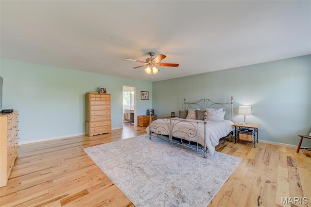1024 Brook Mont Dr, Ofallon, MO 63366 - bedroom featuring light wood-style floors, baseboards, and a ceiling fan