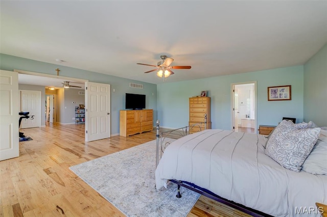 1024 Brook Mont Dr, Ofallon, MO 63366 - bedroom featuring wood finished floors, a ceiling fan, and baseboards