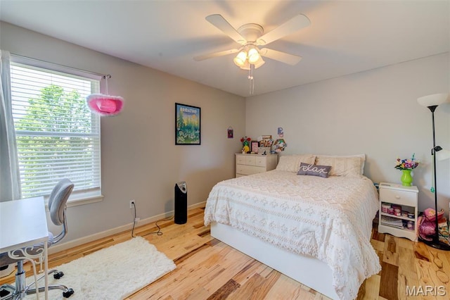 1024 Brook Mont Dr, Ofallon, MO 63366 - bedroom featuring wood finished floors, baseboards, and a ceiling fan