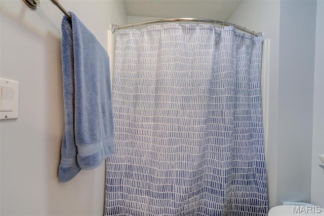 1024 Brook Mont Dr, Ofallon, MO 63366 - bathroom with toilet and a shower with curtain