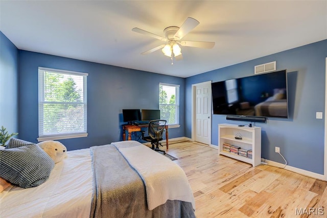 1024 Brook Mont Dr, Ofallon, MO 63366 - bedroom featuring light wood finished floors, baseboards, and a ceiling fan