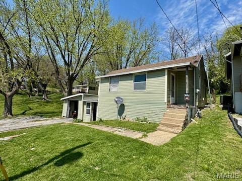 1018 Hayward St, Hannibal, MO 63401 - view of outbuilding featuring an outbuilding