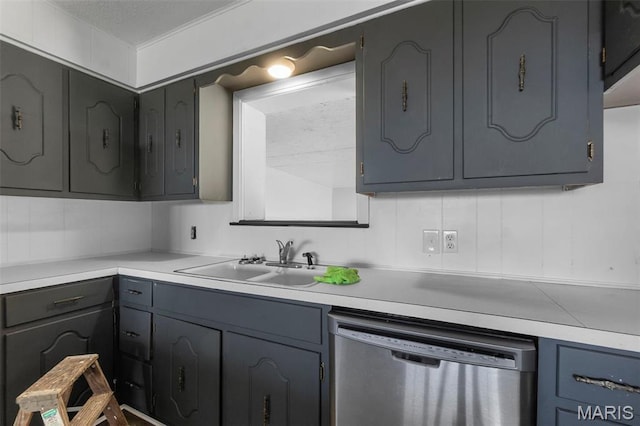 2112 County Highway 264, Gideon, MO 63848 - kitchen with dishwasher, a sink, and light countertops