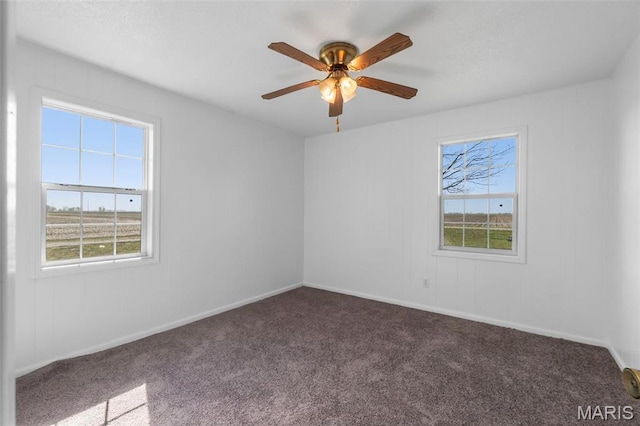 2112 County Highway 264, Gideon, MO 63848 - empty room featuring carpet, a ceiling fan, and baseboards