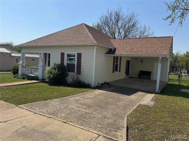 304 Reuter St, Park Hills, MO 63601 - view of front of house with concrete driveway, a carport, and a shingled roof