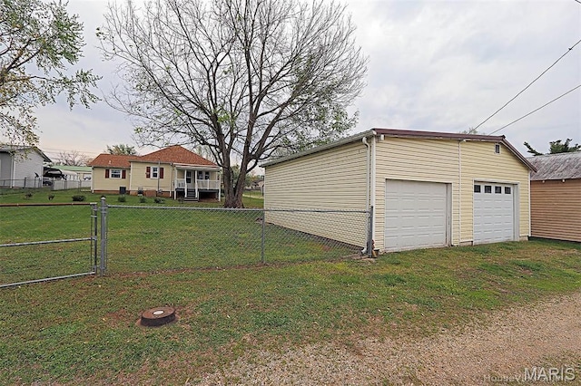 304 Reuter St, Park Hills, MO 63601 - view of yard featuring a detached garage and an outdoor structure