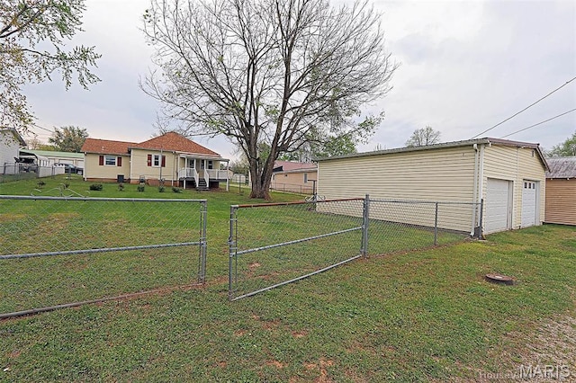 304 Reuter St, Park Hills, MO 63601 - view of yard with a detached garage and a gate