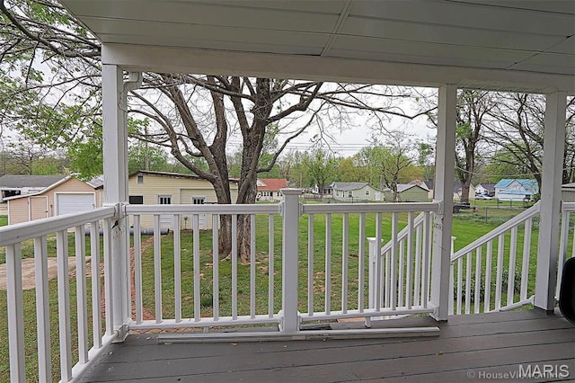 304 Reuter St, Park Hills, MO 63601 - deck featuring a residential view, an outdoor structure, a lawn, and a garage