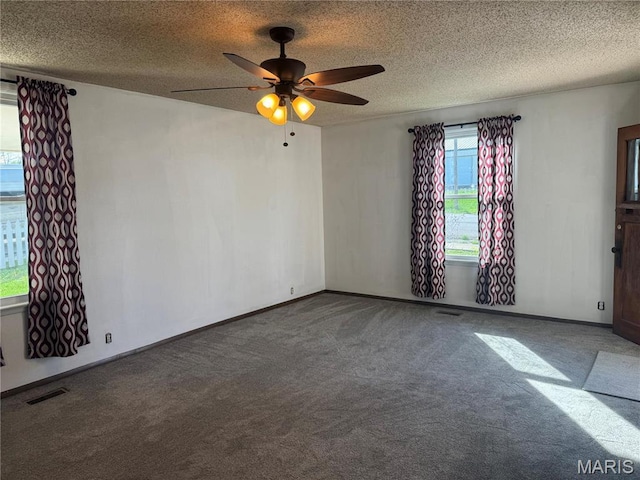 304 Reuter St, Park Hills, MO 63601 - empty room featuring carpet flooring, a ceiling fan, baseboards, and a textured ceiling