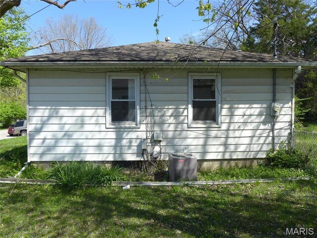 340 Wedge Dr, Saint Louis, MO 63135 - view of property exterior with roof with shingles