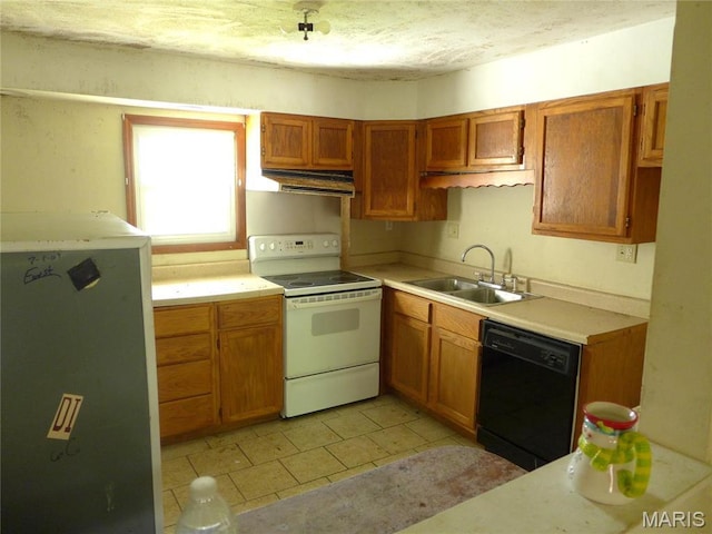 340 Wedge Dr, Saint Louis, MO 63135 - kitchen featuring electric range, a sink, dishwasher, light countertops, and brown cabinets