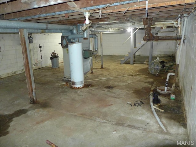 340 Wedge Dr, Saint Louis, MO 63135 - unfinished below grade area with gas water heater and stairs