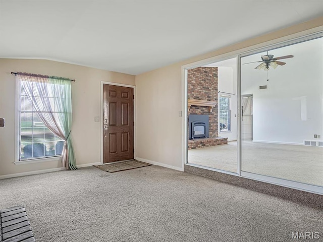 4522 Meadow Ln, Red Bud, IL 62278 - unfurnished living room with carpet flooring, plenty of natural light, vaulted ceiling, and baseboards