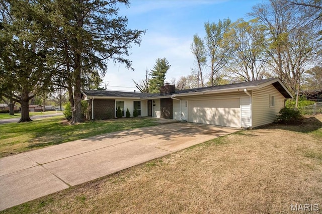 3105 Newgate Dr, Florissant, MO 63033 - ranch-style home featuring a garage, concrete driveway, and a chimney