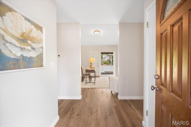 3105 Newgate Dr, Florissant, MO 63033 - foyer with wood finished floors and baseboards