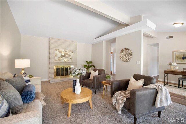 3105 Newgate Dr, Florissant, MO 63033 - carpeted living room with baseboards and a fireplace