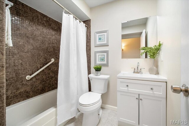 3105 Newgate Dr, Florissant, MO 63033 - bathroom featuring toilet, vanity, tile patterned floors, shower / tub combo, and baseboards