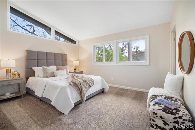 3105 Newgate Dr, Florissant, MO 63033 - carpeted bedroom with vaulted ceiling and baseboards