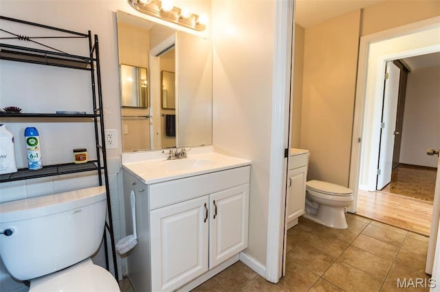 1167 Appleseed Ln Unit D, Olivette, MO 63132 - bathroom featuring toilet, tile patterned floors, and vanity