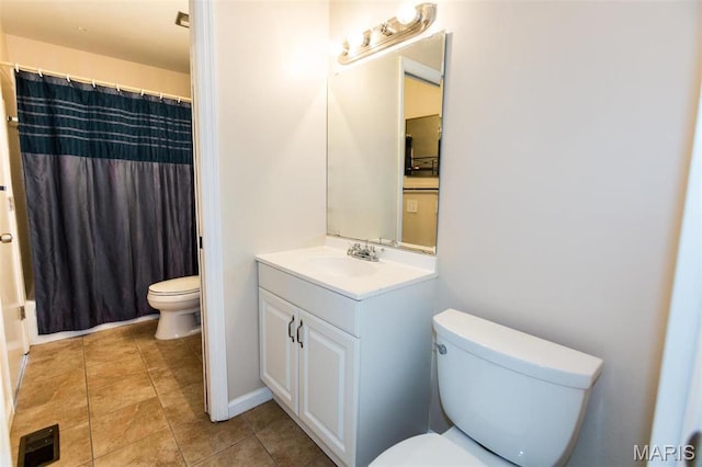 1167 Appleseed Ln Unit D, Olivette, MO 63132 - full bath with toilet, vanity, and tile patterned floors