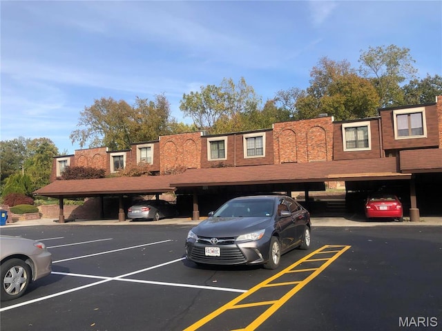 1167 Appleseed Ln Unit D, Olivette, MO 63132 - view of partially covered parking lot