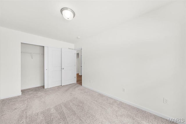 5341 Trailhead Ct, Eureka, MO 63025 - unfurnished bedroom featuring carpet flooring, a closet, and baseboards