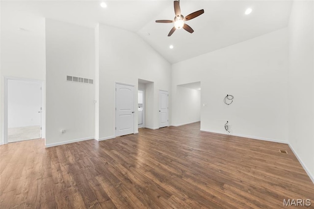 5341 Trailhead Ct, Eureka, MO 63025 - empty room with a ceiling fan, high vaulted ceiling, wood finished floors, baseboards, and recessed lighting