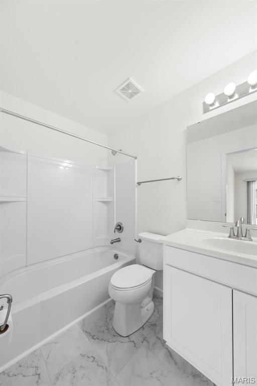 5341 Trailhead Ct, Eureka, MO 63025 - full bath featuring vanity, toilet, marble look tile flooring, and shower / bathtub combination