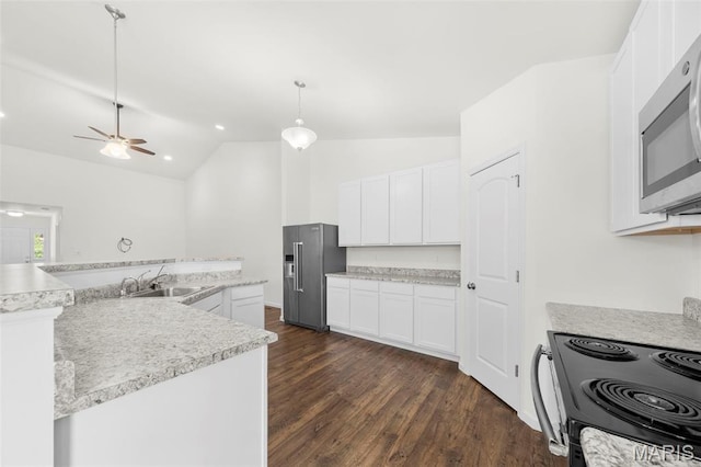 5341 Trailhead Ct, Eureka, MO 63025 - kitchen featuring appliances with stainless steel finishes, a sink, vaulted ceiling, dark wood-style floors, and light countertops