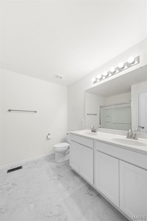 5341 Trailhead Ct, Eureka, MO 63025 - bathroom with marble finish flooring, double vanity, toilet, an enclosed shower, and baseboards
