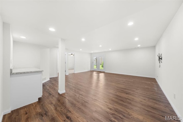 5341 Trailhead Ct, Eureka, MO 63025 - below grade area with recessed lighting, dark wood-style flooring, and baseboards