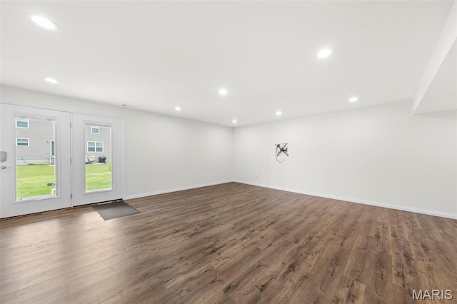 5341 Trailhead Ct, Eureka, MO 63025 - unfurnished living room featuring dark wood-type flooring, recessed lighting, and baseboards