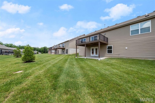 5341 Trailhead Ct, Eureka, MO 63025 - rear view of house featuring a lawn and a patio