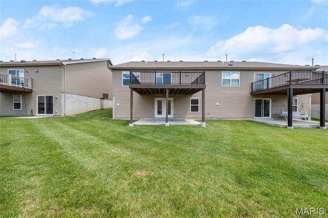 5341 Trailhead Ct, Eureka, MO 63025 - back of house featuring a patio area, a lawn, and a wooden deck