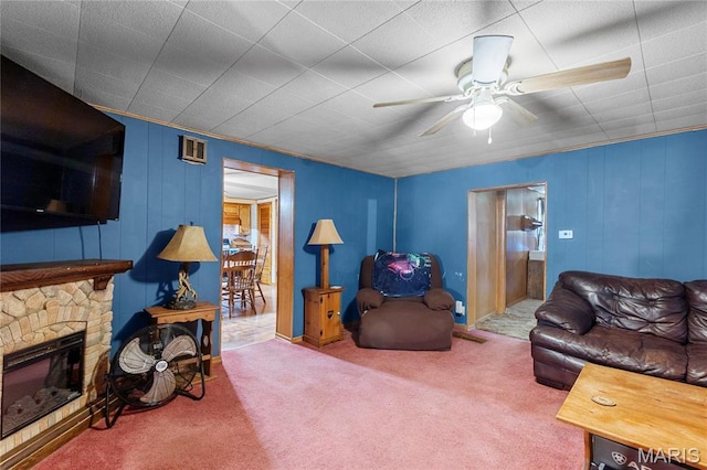 1821 Pcr 916, Perryville, MO 63775 - carpeted living room featuring a ceiling fan and a fireplace