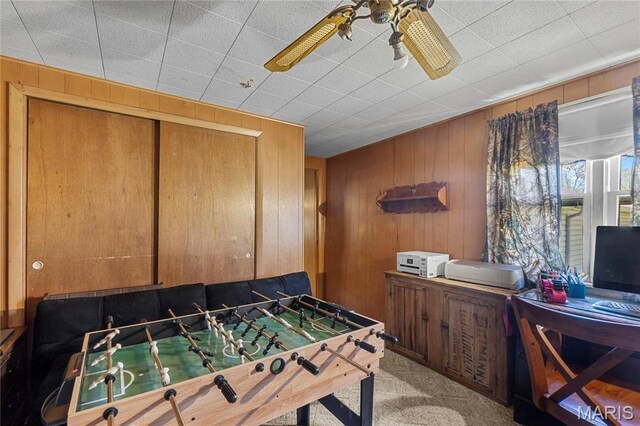 1821 Pcr 916, Perryville, MO 63775 - playroom with carpet, wood walls, and ceiling fan