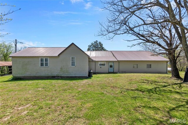 1821 Pcr 916, Perryville, MO 63775 - rear view of property with metal roof and a lawn