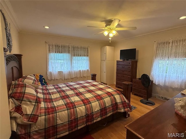 455 Country Club Dr, Hannibal, MO 63401 - bedroom featuring wood finished floors, ornamental molding, and ceiling fan