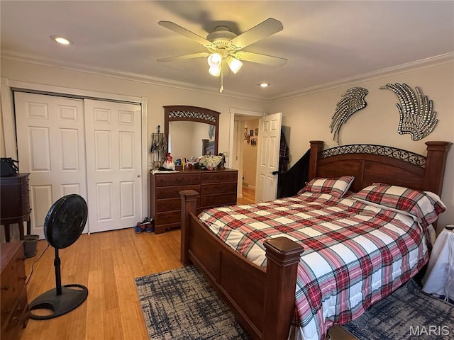 455 Country Club Dr, Hannibal, MO 63401 - bedroom featuring crown molding, a closet, light wood-type flooring, ceiling fan, and recessed lighting