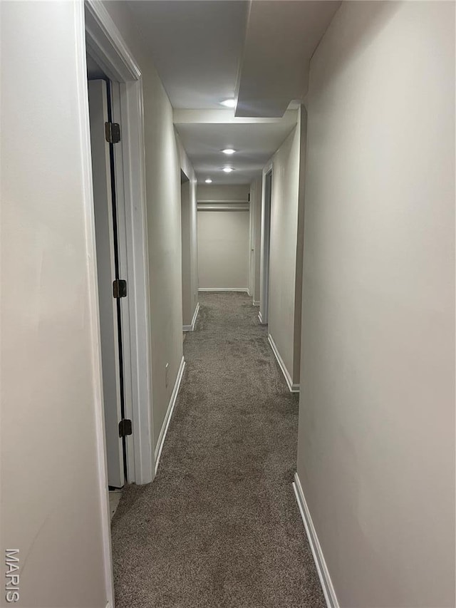 455 Country Club Dr, Hannibal, MO 63401 - hall featuring dark colored carpet and baseboards