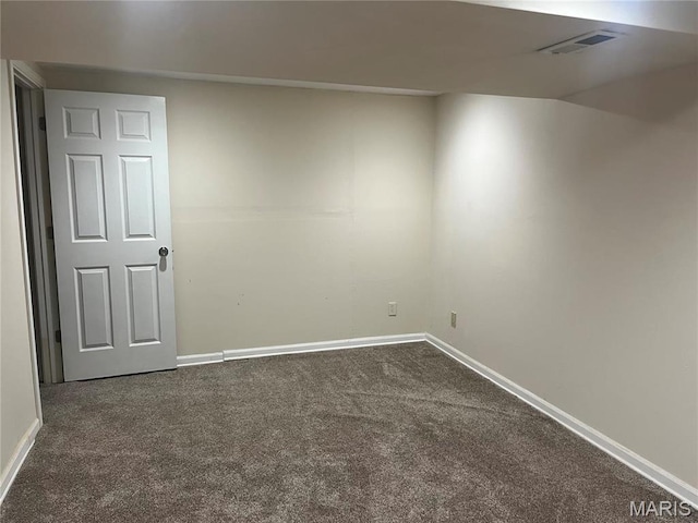 455 Country Club Dr, Hannibal, MO 63401 - unfurnished room with dark carpet and baseboards