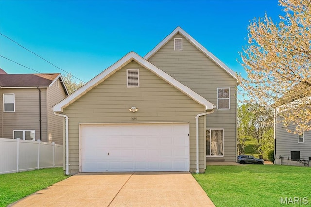 4007 Lafayette Ave, Saint Louis, MO 63110 - traditional-style house with a garage and concrete driveway