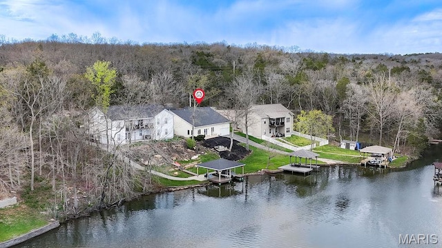 632 N Lafitte Dr, Bonne Terre, MO 63628 - view from above of property featuring a heavily wooded area and a nearby body of water