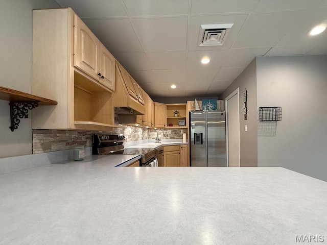632 N Lafitte Dr, Bonne Terre, MO 63628 - kitchen with appliances with stainless steel finishes, open shelves, tasteful backsplash, light countertops, and a paneled ceiling