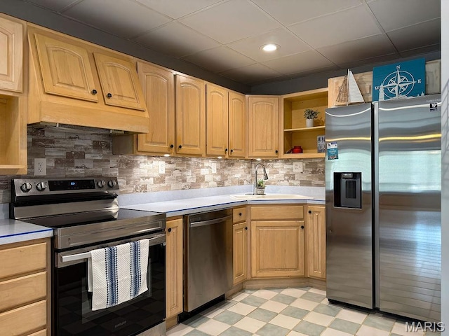 632 N Lafitte Dr, Bonne Terre, MO 63628 - kitchen featuring stainless steel appliances, a sink, tasteful backsplash, light floors, and light countertops