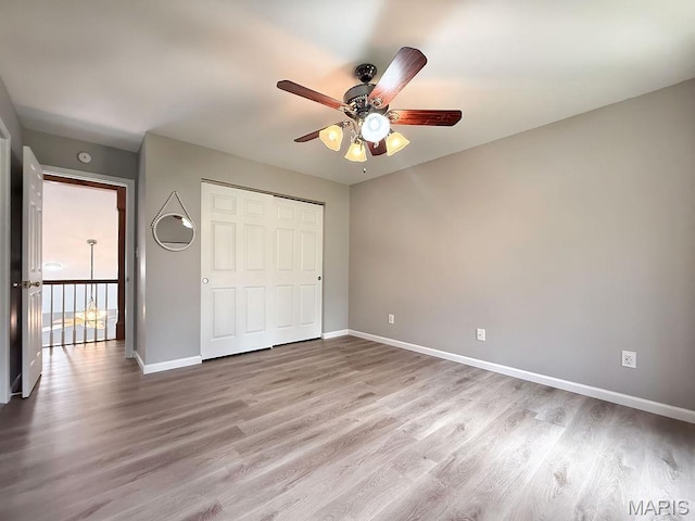 632 N Lafitte Dr, Bonne Terre, MO 63628 - unfurnished bedroom featuring baseboards, wood finished floors, and a closet